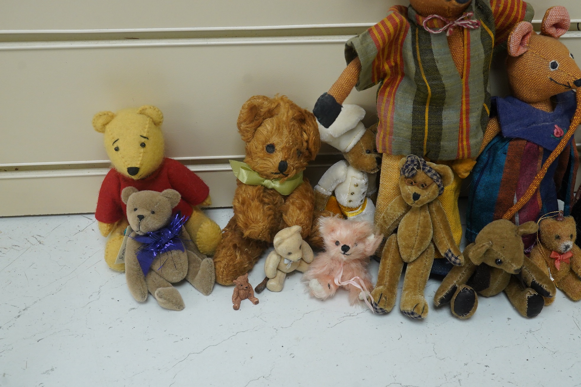 Eleven bears, two artist mice, two miniature red label Steiff, etc. (15). Condition - fair to good.